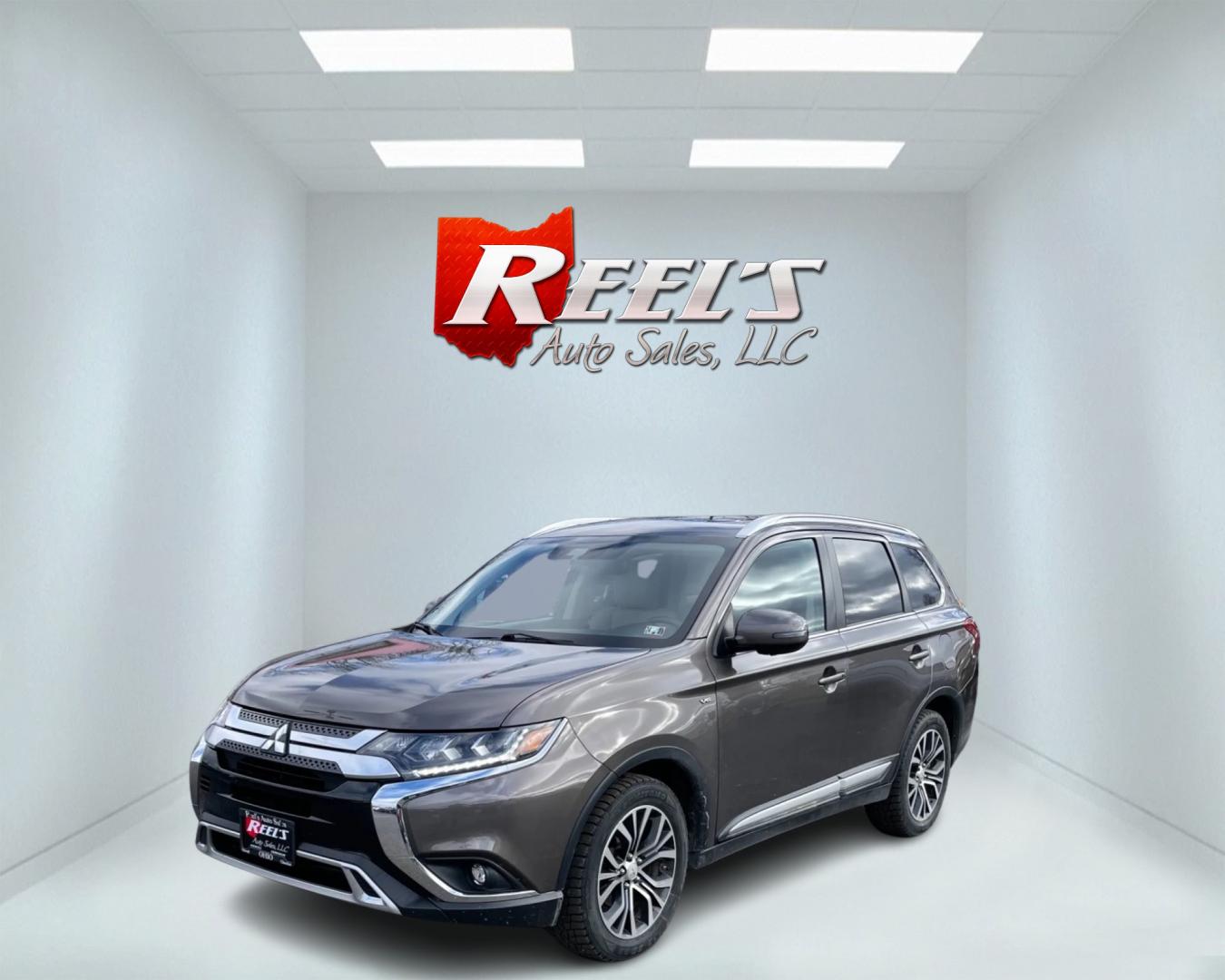 2019 Brown /Tan Mitsubishi Outlander GT Touring S-AWC (JA4JZ4AX7KZ) with an 3.0L SOHC V6 engine, 6-Speed Automatic transmission, located at 547 E. Main St., Orwell, OH, 44076, (440) 437-5893, 41.535435, -80.847855 - Photo#0